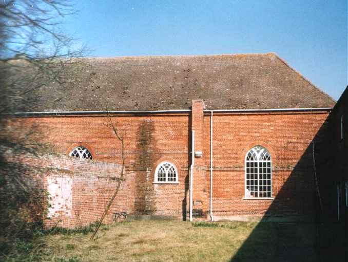 Out of the shadows: the chapel. The little courtyard might have been a garden, or perhaps a burial ground.