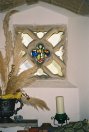 Window let into the south aisle to light an altar.