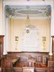 Family pew, and Arlington memorial, in the south aisle.