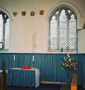 South transept. The altar is set to the east in the proper manner.