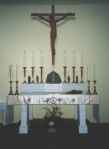 The sanctuary. Note the statues on the retable.