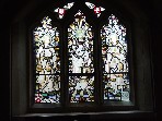 Justice and Charity flank the Risen Christ