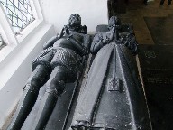 William and Alice Poley wait patiently in polished wood for Judgement Day.