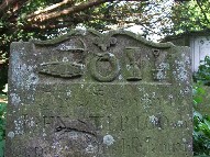 coffin, pick, serpent, hour glass and spade