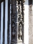 cornerpost of the guildhall - spot the unrestored carving