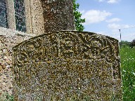 cherubs flanking weeping willow and urn with crossed bones