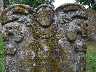 cherub and skulls