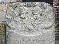 winged cherubs and flowers